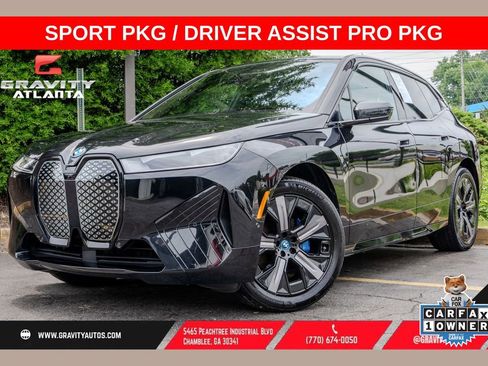 Used 2024 BMW iX xDrive50 w/ Premium Package AWD/4WD image 1