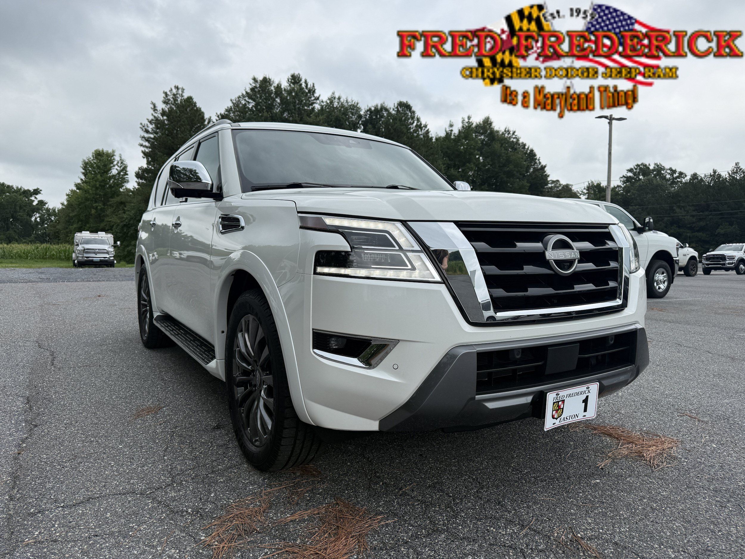 Used 2023 Nissan Armada Platinum w/ Captain's Chairs Package AWD/4WD image 1