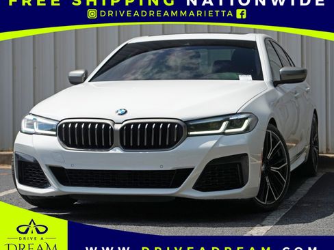 Used 2023 BMW M550i xDrive AWD/4WD image 1
