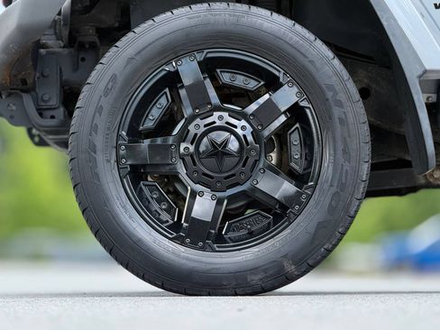 Used 2014 Jeep Wrangler Unlimited Rubicon w/ Dual Top Group AWD/4WD image 18