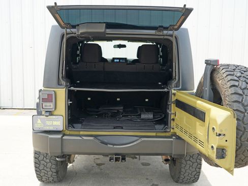 Used 2013 Jeep Wrangler Unlimited Sport w/ Mopar Black Appearance Group image 9