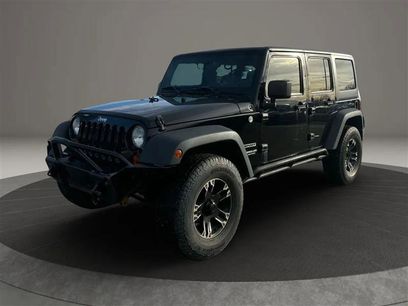 Used 2013 Jeep Wrangler Unlimited Sport