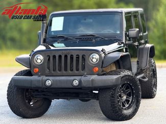 Used 2011 Jeep Wrangler Unlimited Sport image 1
