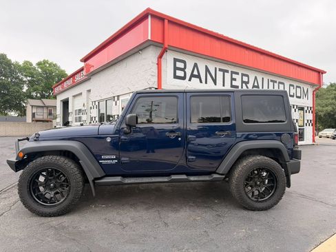 Used 2013 Jeep Wrangler Unlimited Sport AWD/4WD image 1