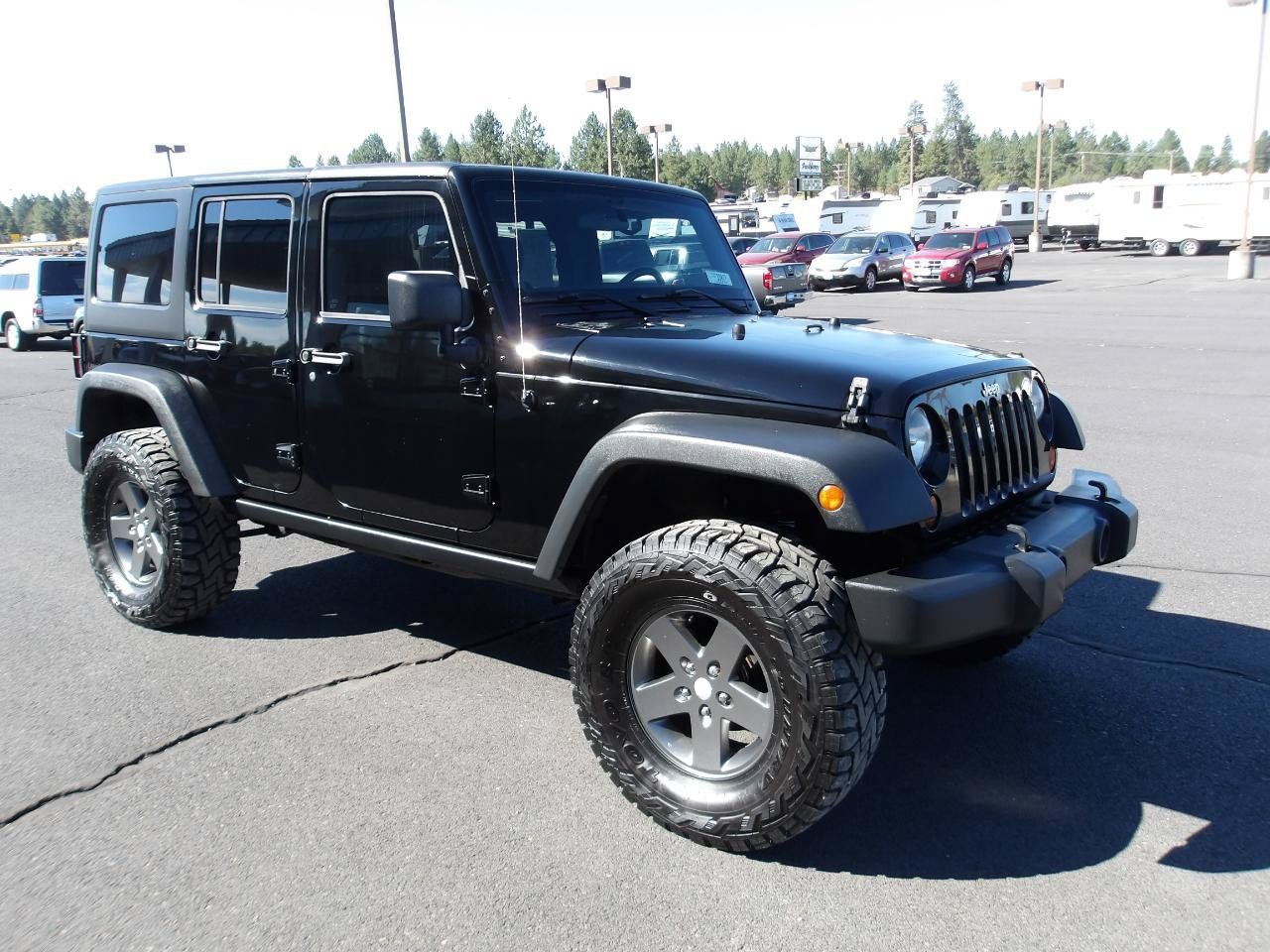 Used 2011 Jeep Wrangler Unlimited Rubicon w/ Dual Top Group AWD/4WD image 7
