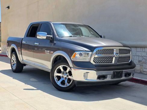 Used 2016 RAM 1500 Laramie w/ Convenience Group AWD/4WD image 1