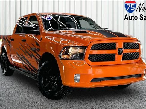 Used 2019 RAM 1500 Express w/ Ignition Orange Sport Package AWD/4WD image 1