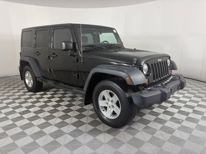 Used 2013 Jeep Wrangler Unlimited Sport w/ Dual Top Group