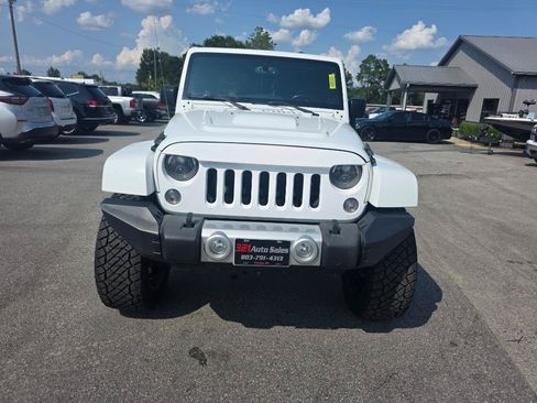 Used 2015 Jeep Wrangler Unlimited Sahara AWD/4WD image 1