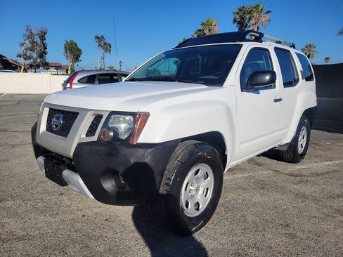 Used 2012 Nissan Xterra X RWD image 1