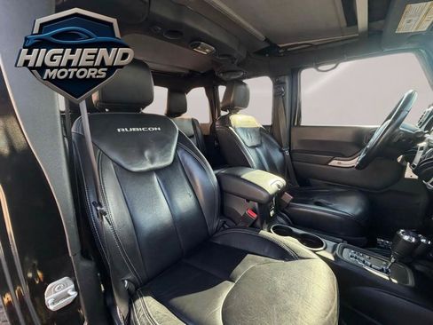 Used 2014 Jeep Wrangler Unlimited Rubicon w/ Dual Top Group AWD/4WD image 15