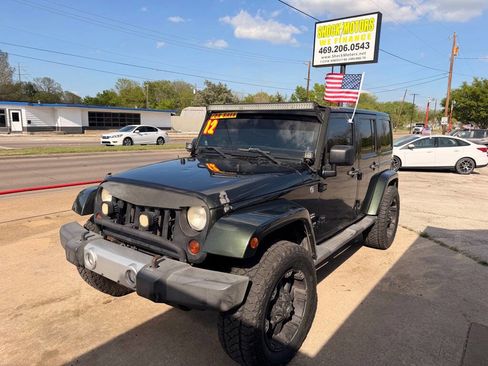 Used 2012 Jeep Wrangler Unlimited Sahara w/ Connectivity Group image 1
