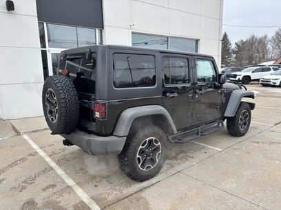 Used 2011 Jeep Wrangler Unlimited Rubicon w/ Dual Top Group