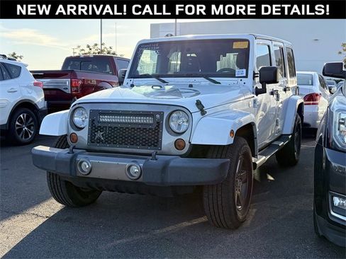 Used 2012 Jeep Wrangler Unlimited Sport image 1