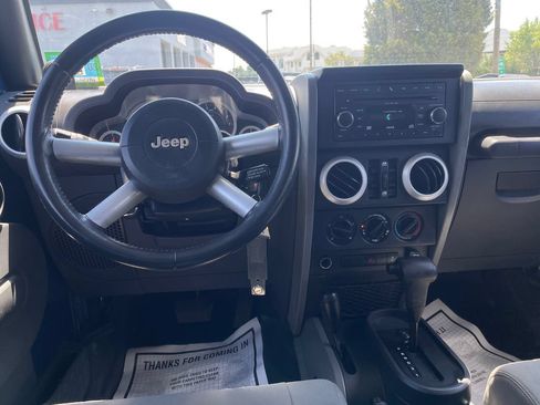 Used 2010 Jeep Wrangler Unlimited Sahara w/ Dual Top Group AWD/4WD image 16