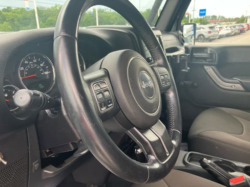 Used 2015 Jeep Wrangler Unlimited Sport w/ Connectivity Group AWD/4WD image 9