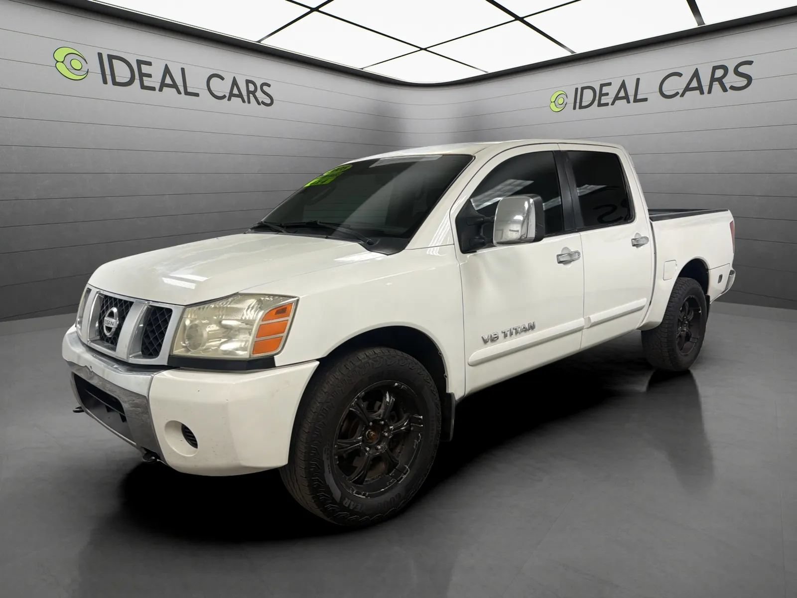 Used 2005 Nissan Titan SE w/ (W01) Utility Bed Pkg AWD/4WD image 1