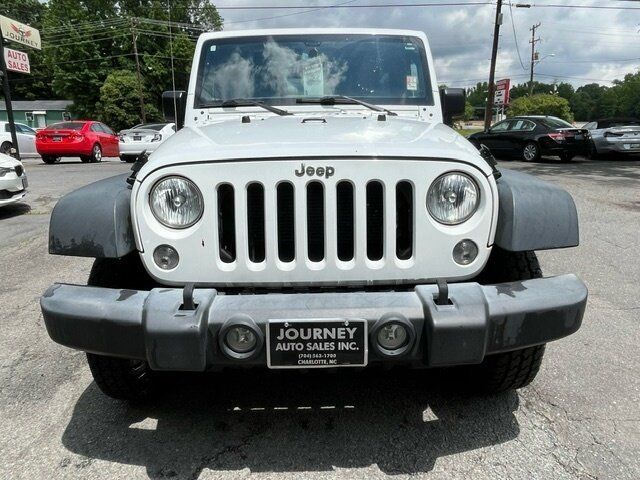 Used 2017 Jeep Wrangler Unlimited Sport w/ Mopar Black Appearance Group AWD/4WD image 2