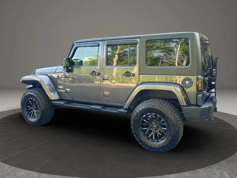 Used 2014 Jeep Wrangler Unlimited Sahara w/ Dual Top Group AWD/4WD image 7