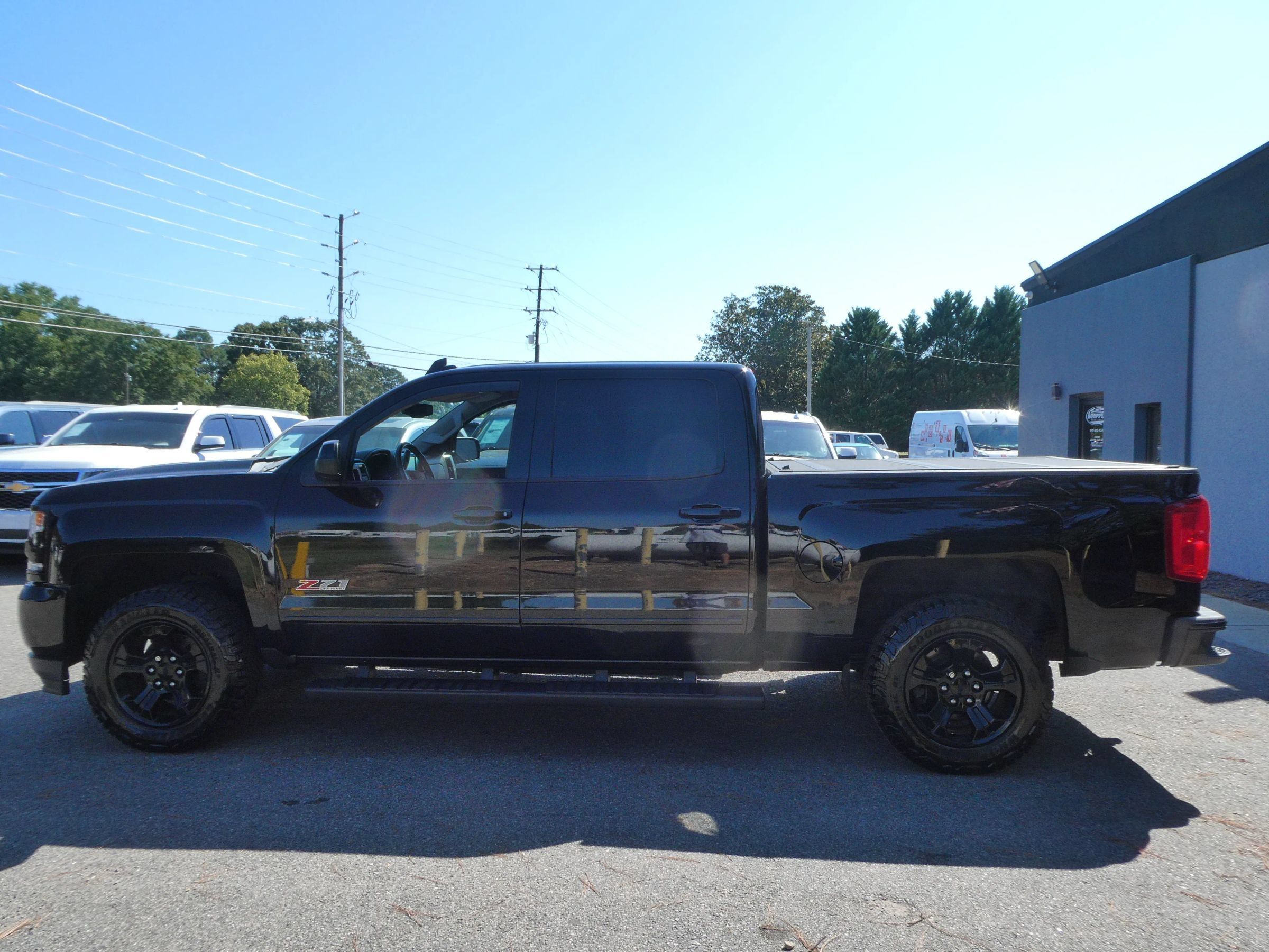 Used 2016 Chevrolet Silverado 1500 LTZ Z71 w/ LTZ Plus Package AWD/4WD image 9