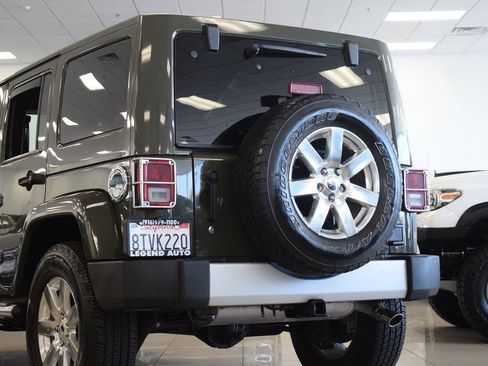 Used 2015 Jeep Wrangler Unlimited Sahara w/ Dual Top Group AWD/4WD image 25