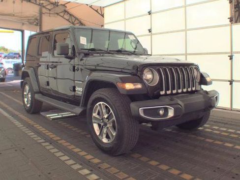 Used 2021 Jeep Wrangler Unlimited Sahara AWD/4WD image 1