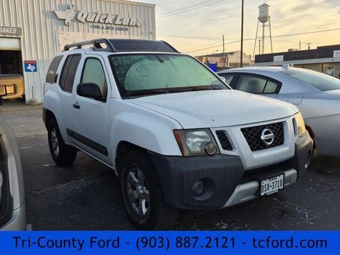 Used 2013 Nissan Xterra S image 1