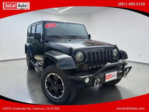 Used 2012 Jeep Wrangler Unlimited Sahara AWD/4WD image 1