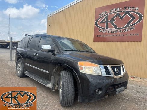 Used 2011 Nissan Armada Platinum w/ 2nd Row Captain Seat Pkg image 1