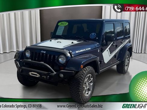 Used 2013 Jeep Wrangler Unlimited Rubicon w/ Dual Top Group AWD/4WD image 1