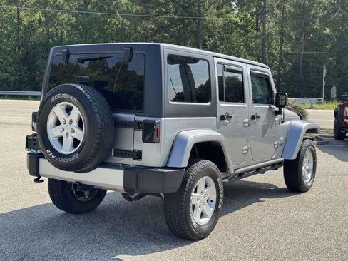 Used 2013 Jeep Wrangler Unlimited Sahara w/ Dual Top Group AWD/4WD image 20