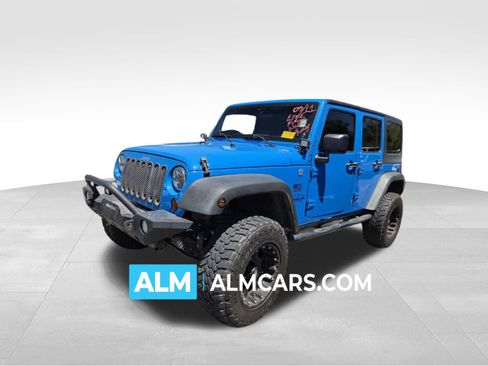 Used 2011 Jeep Wrangler Unlimited Sport AWD/4WD image 1
