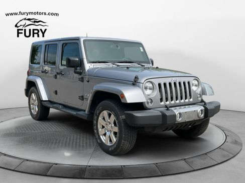 Used 2016 Jeep Wrangler Unlimited Sahara w/ Max Tow Package AWD/4WD image 1
