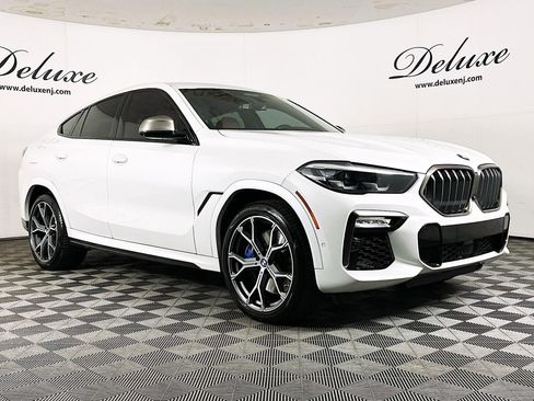 Used 2021 BMW X6 M50i AWD/4WD image 1