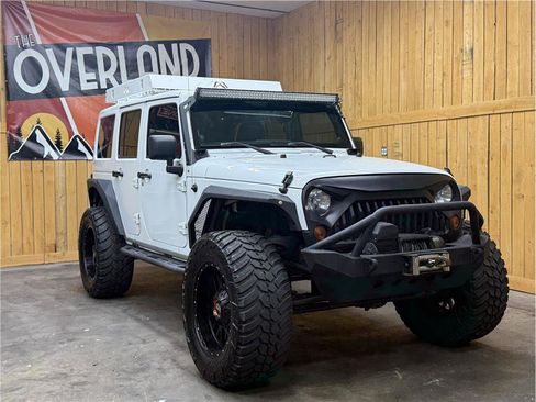Used 2012 Jeep Wrangler Unlimited Sahara w/ Connectivity Group AWD/4WD image 1