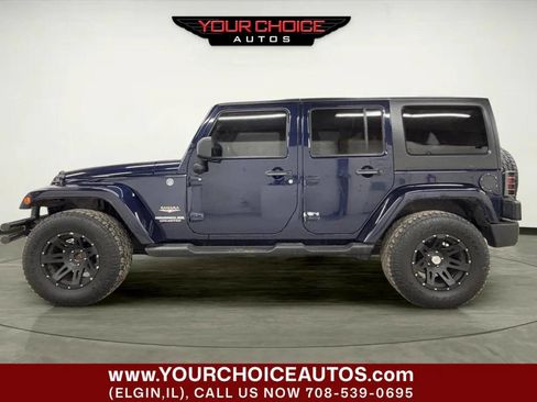 Used 2013 Jeep Wrangler Unlimited Sahara w/ Dual Top Group image 2