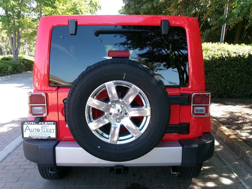 Used 2013 Jeep Wrangler Unlimited Sahara w/ Mopar Chrome Edition Group AWD/4WD image 6