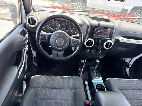 Used 2012 Jeep Wrangler Unlimited Sport AWD/4WD image 11