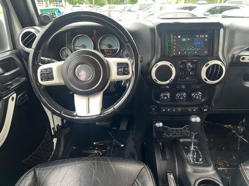 Used 2014 Jeep Wrangler Unlimited Sahara AWD/4WD image 12