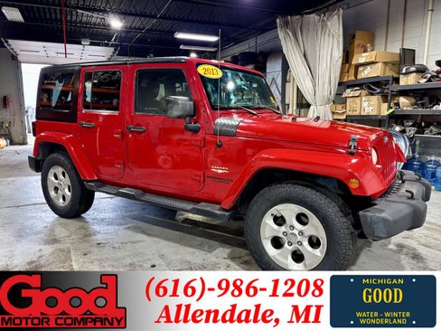 Used 2013 Jeep Wrangler Unlimited Sahara AWD/4WD image 1