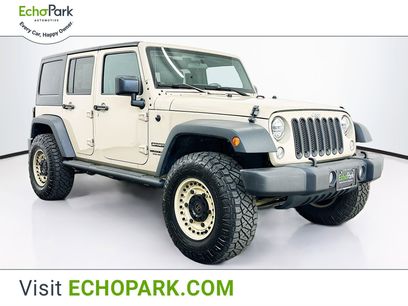 Used 2017 Jeep Wrangler Unlimited Sport w/ Mopar Black Appearance Group