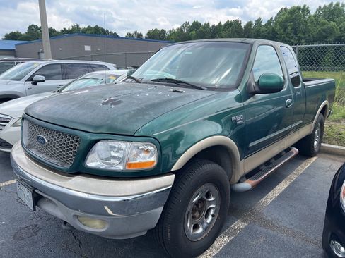 Used 1999 Ford F150 4x4 SuperCab image 1