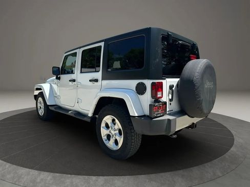 Used 2014 Jeep Wrangler Unlimited Sahara w/ Dual Top Group AWD/4WD image 7