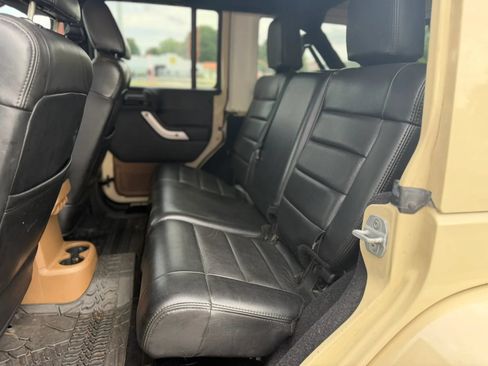 Used 2012 Jeep Wrangler Unlimited Sahara w/ Dual Top Group AWD/4WD image 10