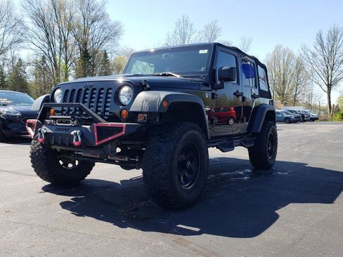 Used 2013 Jeep Wrangler Unlimited Sahara image 1