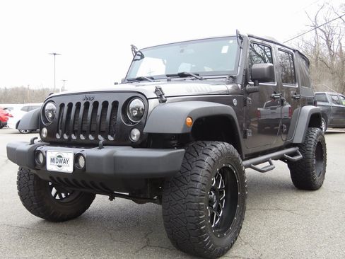 Used 2018 Jeep Wrangler Unlimited Sport image 1