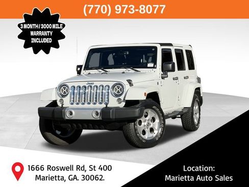 Used 2014 Jeep Wrangler Unlimited Sahara w/ Max Tow Package image 1