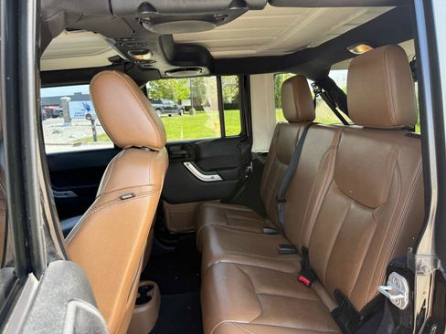 Used 2013 Jeep Wrangler Unlimited Sahara w/ Dual Top Group AWD/4WD image 16