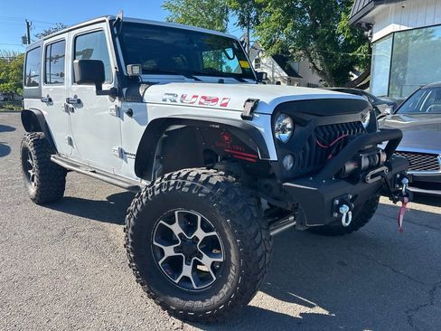 Used 2015 Jeep Wrangler Unlimited Rubicon w/ Connectivity Group AWD/4WD image 1