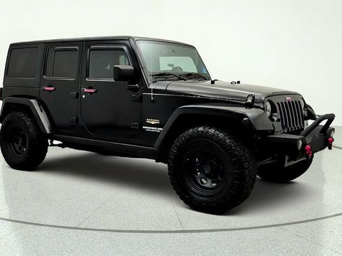 Used 2012 Jeep Wrangler Unlimited Sahara w/ Dual Top Group AWD/4WD image 3